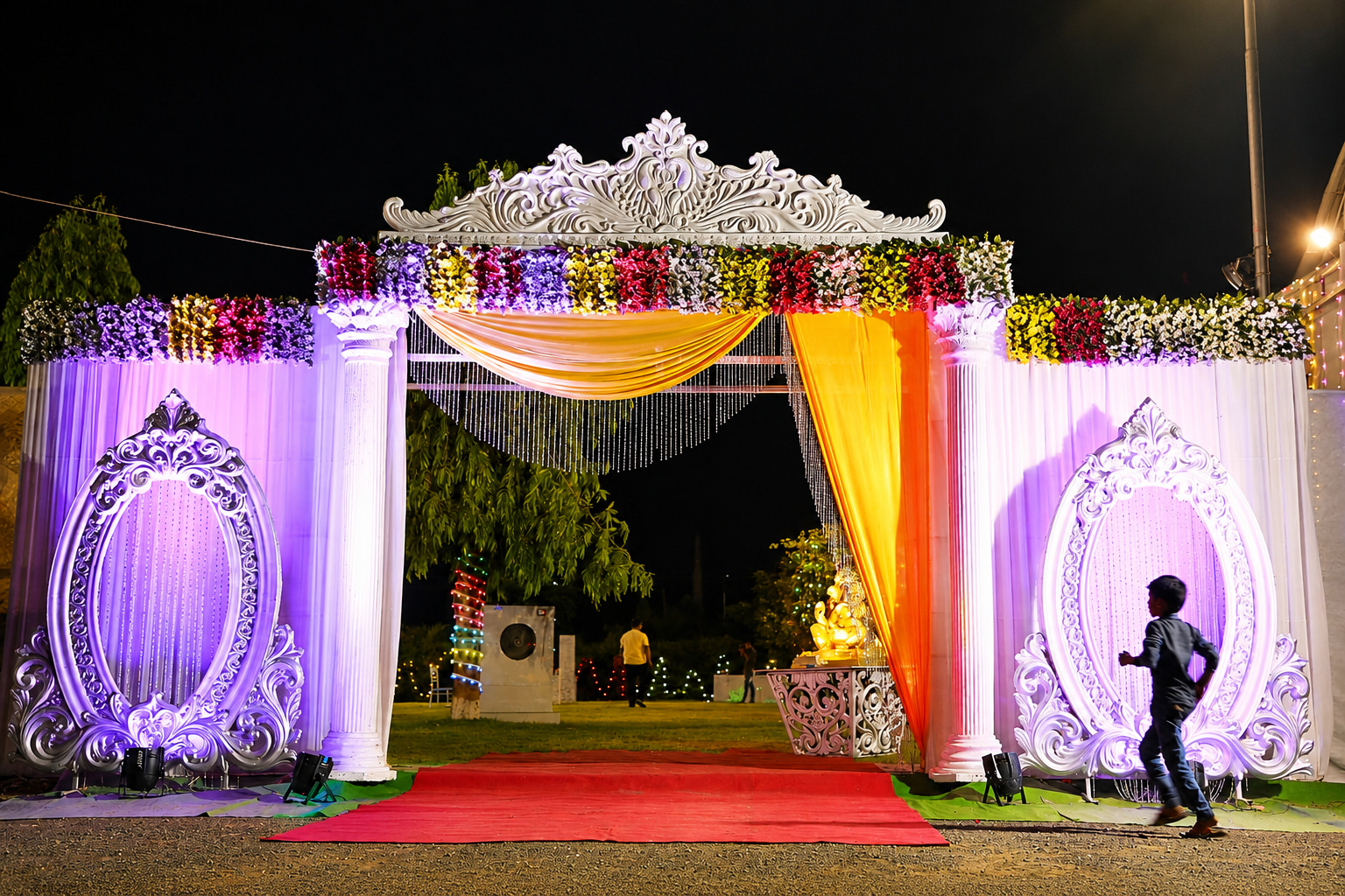 Colorful Wedding Entrance Under the Night Sky