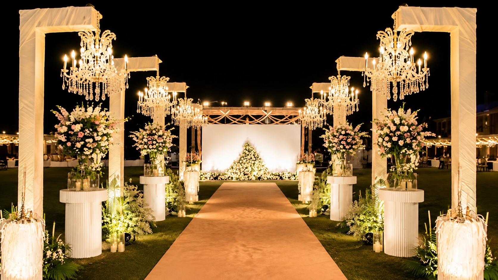 Golden Chandeliers Wedding Aisle at Night